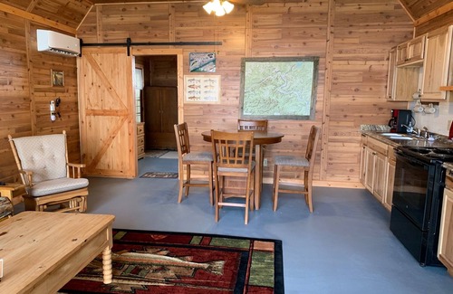 Norfork Cottage | Cozy White River Cabin, perfect for a couple's getaway or fishing trip!