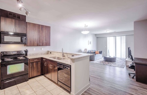 Central Business District Apartment | CozySuites at the Banks gym, pool 03