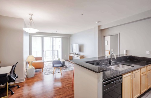 Central Business District Apartment | CozySuites at the Banks gym, pool 13