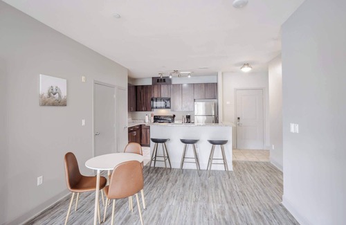 Central Business District Apartment | CozySuites at the Banks gym, pool 15
