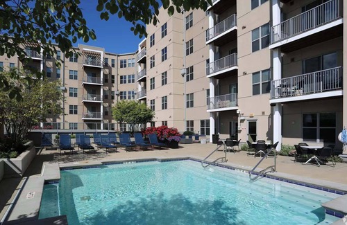 Central Business District Apartment | CozySuites at the Banks gym, pool 14