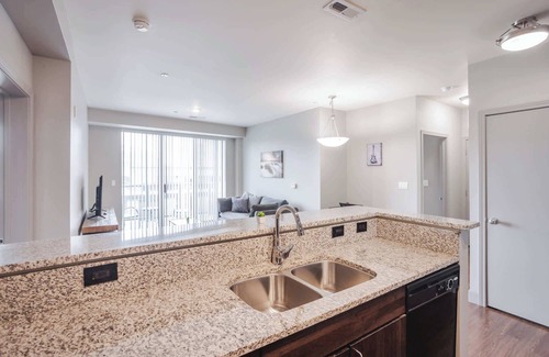 Central Business District Apartment | CozySuites at the Banks gym, pool 09