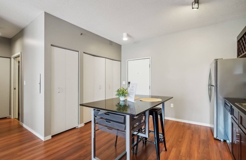 Mill District Apartment | CozySuites Mill District with pool, gym # 10