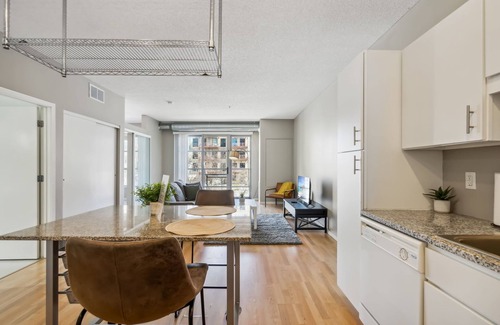 Mill District Apartment | CozySuites Mill District with pool, gym #11