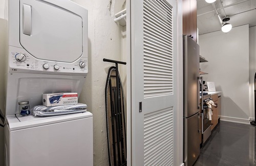 Warehouse District Apartment | CozySuites NLG w/pool, bowling alley, sauna #24
