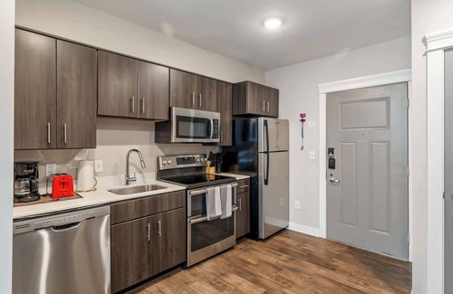 Mile Square Apartment | CozySuites - Penrose On Mass with pool & parking #1