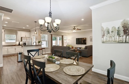 Hazel Heights House | Craftsman Grove - A Tranquil Retreat in GNV, spacious primary bedroom, sleeps 7