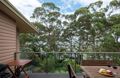 Tomakin House | Creative Three Level Retreat with Lovely Sea Views