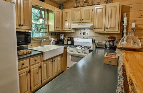 Ellijay Cabin | Creekfront Cabin with Waterfall. Hot Tub, Fire Pit, Gameroom, and more.