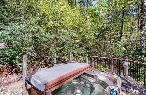 Cashes Valley Cabin | Creekside cabin w/rustic elegance, private hot tub & beautiful screened-in porch