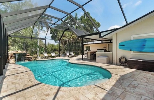 Bonita Springs House | Creekside home with pool and lanai close to downtown Bonita Springs!
