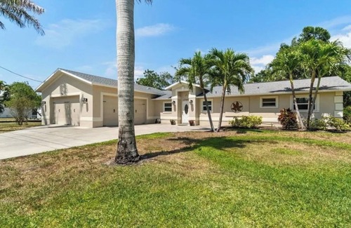 Bonita Springs House | Creekside home with pool and lanai close to downtown Bonita Springs!