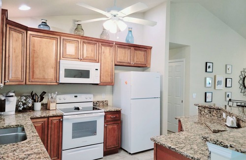 Fort Myers House | Crescent Moon Tranquil Waterfront Hideaway with Heated Saltwater Pool and Spa