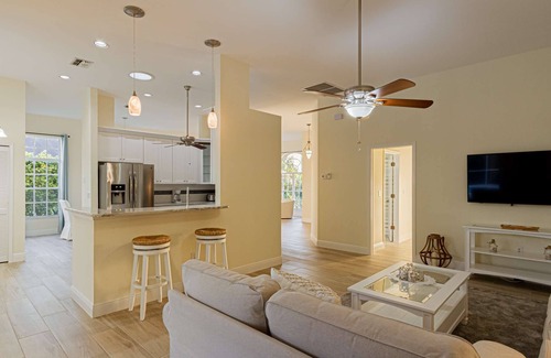 Crown Pointe House | Crown Pointe Heated Pool Home, Covered Lanai w/TV- Renovated w/Coastal Flair, King in Master