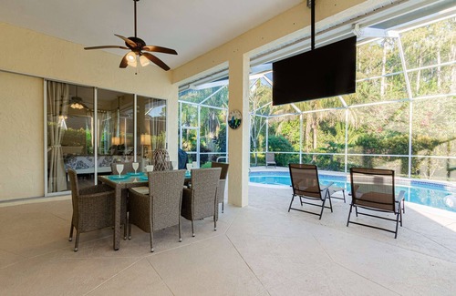 Crown Pointe House | Crown Pointe Heated Pool Home, Covered Lanai w/TV- Renovated w/Coastal Flair, King in Master