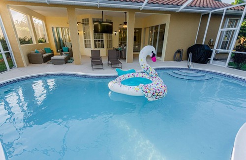Crown Pointe House | Crown Pointe Heated Pool Home, Covered Lanai w/TV- Renovated w/Coastal Flair, King in Master