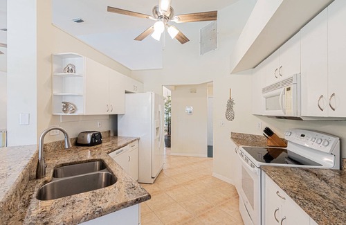 Crown Pointe House | Crown Pointe lake view heated pool home (w/2 King bedrooms) minutes to downtown & beaches!