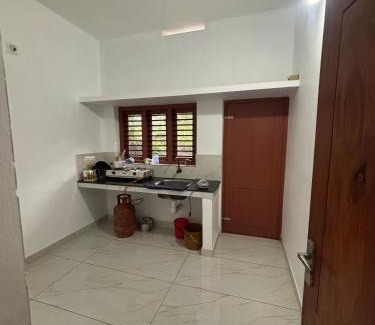 Kedavur House | CT HOMESTAY, Omassery