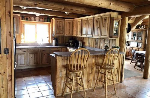 Cody House | Custom Log Cabin with Breathtaking Views of Buffalo Bill Reservoir and Carter Mt
