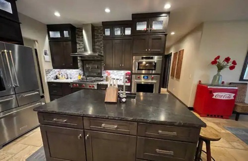 Sheridan House | Custom mountain-modern home with Big Horn views