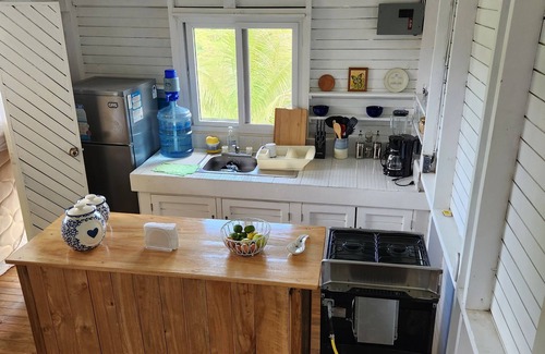 Rio Dulce Cabin | Cute & Cozy Caribbean Cabin on a farm.