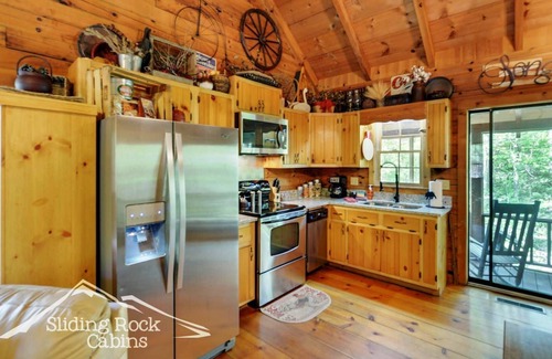 Ellijay Cabin | Cute Creekfront, rustic, hot tub, pet friendly-fenced yard, screened porch