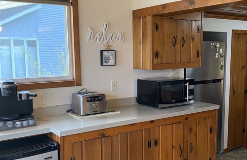 Cadillac Cottage | Cute lakefront cottage on Lake Mitchell in Cadillac, Michigan