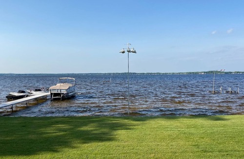 Cadillac Cottage | Cute lakefront cottage on Lake Mitchell in Cadillac, Michigan
