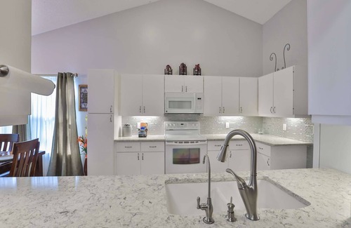 Braden River House | Cypress Lake Home - Family Pool Oasis with Slide!
