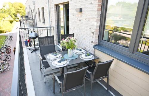 Tossens Apartment | Dünenzauber - Neues Apartment mit Sauna in Strandnähe