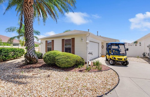 Villas of Greenwood Villa | DARLING 2 BEDROOM VILLA WITH ENCLOSED LANAI LARGE BACKYARD AND GOLF CART