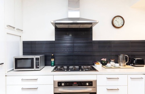 Rapid Creek Apartment | Darwin Style Tropical Luxury Apartment + WARM POOL + Bikes + Pet Croc