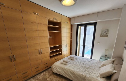 Jerusalem City Centre Apartment | David's Village with Pool & Patio for Families by FeelHome
