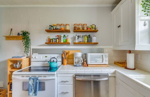 Southeast Pensacola Cottage | Deck & Grill: Downtown Pensacola Vacation Rental