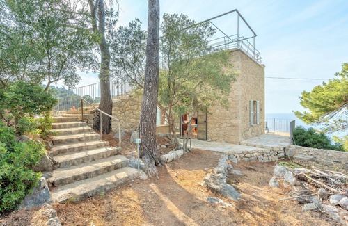 Deia Apartment | Deia tower overlooking the sea and it famous cove.