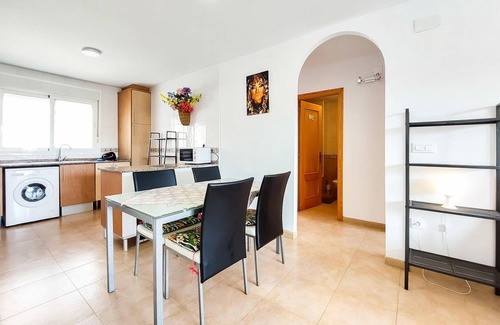 Vinaros Apartment | Delight your family with this beachfront vacation rental with shared outdoor pool.