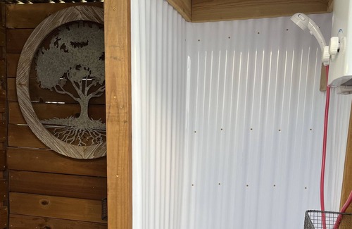 Royse City RV Rental | Delightful Belle Tent on 10 Acres With Private Outdoor Shower!