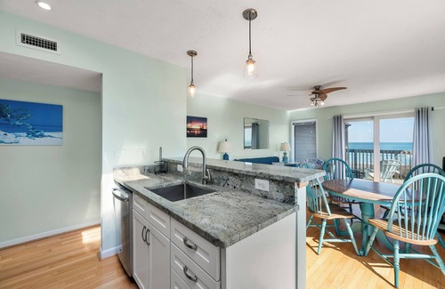 Duck Condo | Delightful Diversion: Oceanfront Condo | Shared Pool