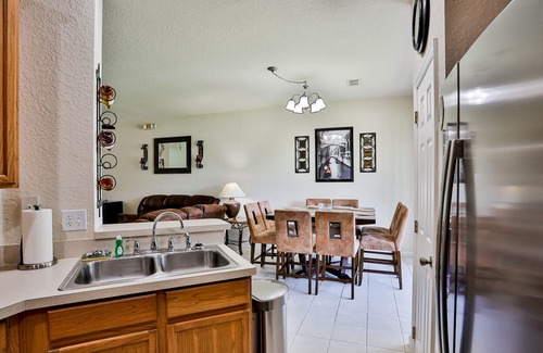 Trafalgar Village House | Delightful lakefront townhome with pool, volleyball, fast WiFi & AC
