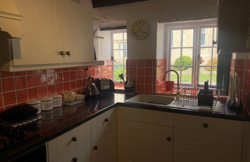 West Knighton House | Delightful mid-row thatched cottage in beautiful sleepy Dorset village.