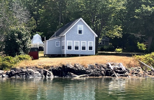 Pleasant Point Cottage | Delightful waterfront cottage with beautiful views of the sunset.