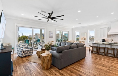 Navarre Beach House | "Delta Dawn" New Listing! Luxury Waterfront Home, Pool, Boat Dock