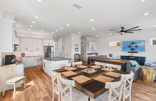 Navarre Beach House | "Delta Dawn" New Listing! Luxury Waterfront Home, Pool, Boat Dock