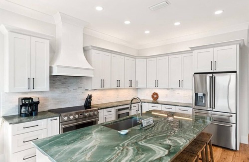 Navarre Beach House | "Delta Dawn" New Listing! Luxury Waterfront Home, Pool, Boat Dock