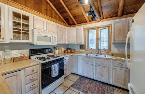 Delton Cabin | Delton Oasis Retreat w/Lake Views & Deck!