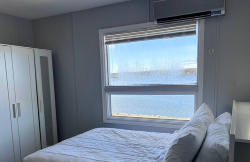 Sydney House | Deluxe Queen Room with beautiful views overlooking the water!