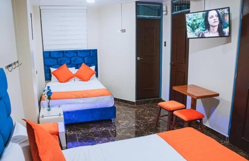 Santiago de Surco Apartment | Deluxe Queen Room with Two Queen Beds 4