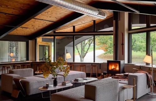 Stowe Area Hotel | Deluxe Riverside King w/Patio | Tälta Lodge, a Bluebird by Lark | River Access