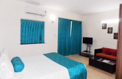 Assagao Apartment | Deluxe Room with one Bedrooms