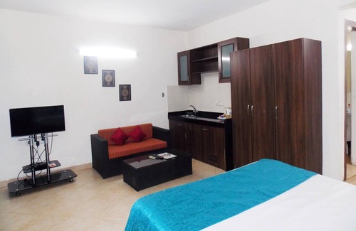 Assagao Apartment | Deluxe Room with one Bedrooms